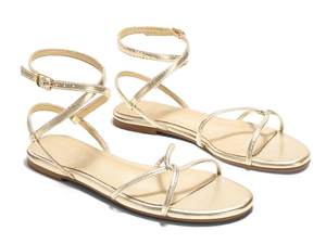 Coutgo Womens Flat Sandals Strappy Open Toe Cross Lace Up Ankle Strap Summer Dressy Beach Shoes Gold 8